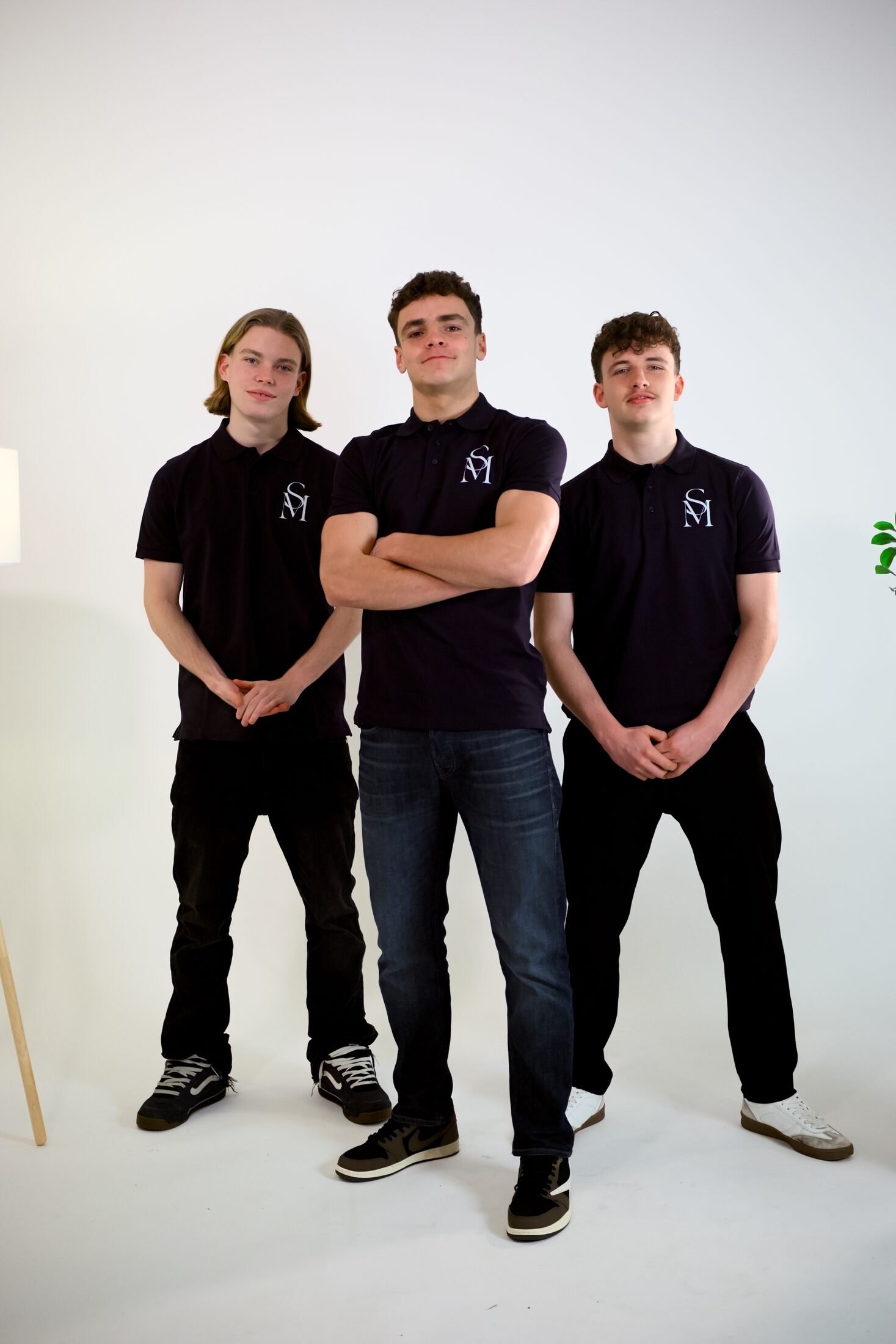 Schneider Medien Team in SM-Polos